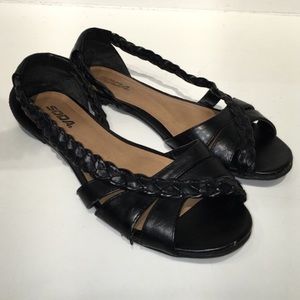 Black faux leather flats